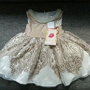 Beautiful sequined dress with beaded detail.